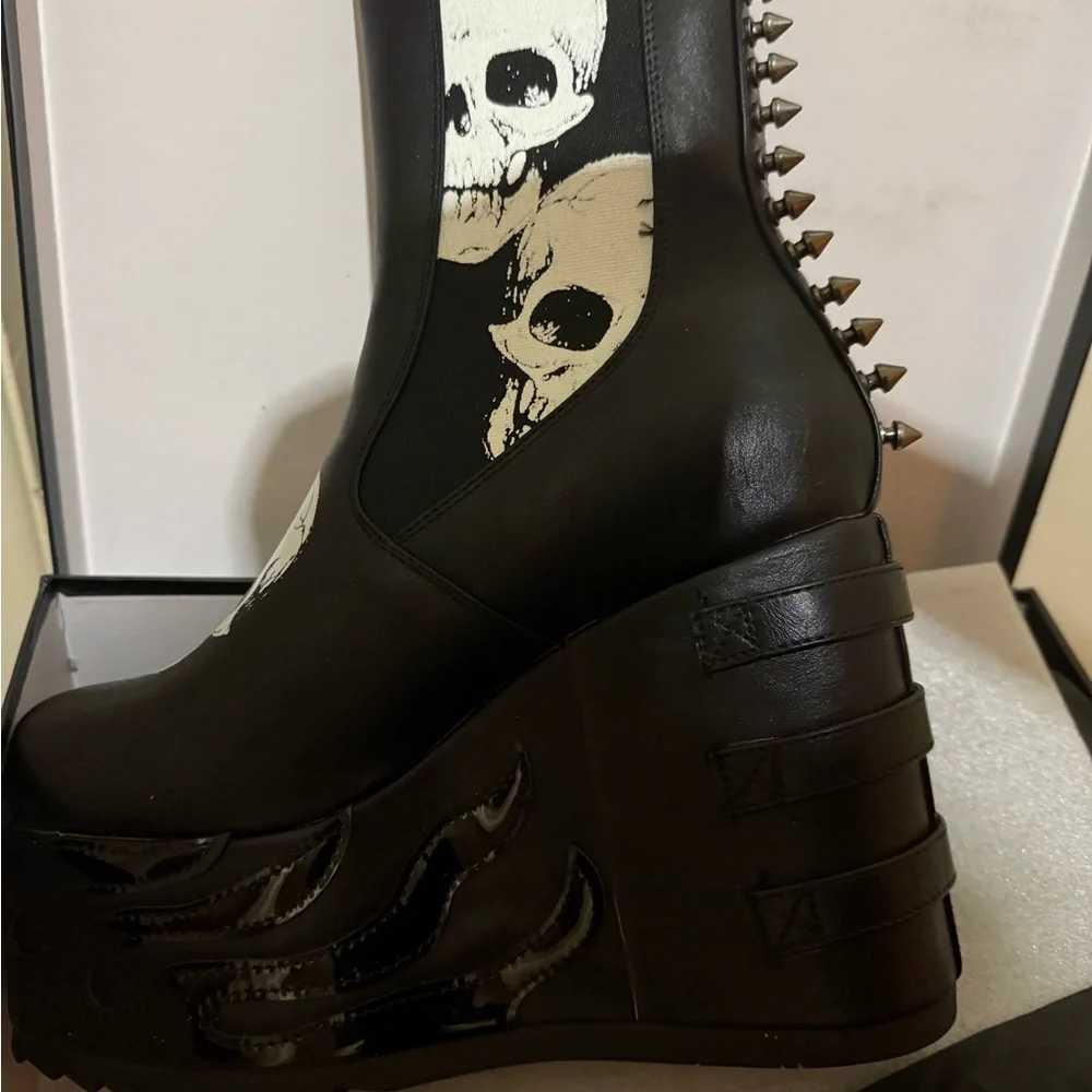 Edgy Black and White Platform Boots with Skull Motif